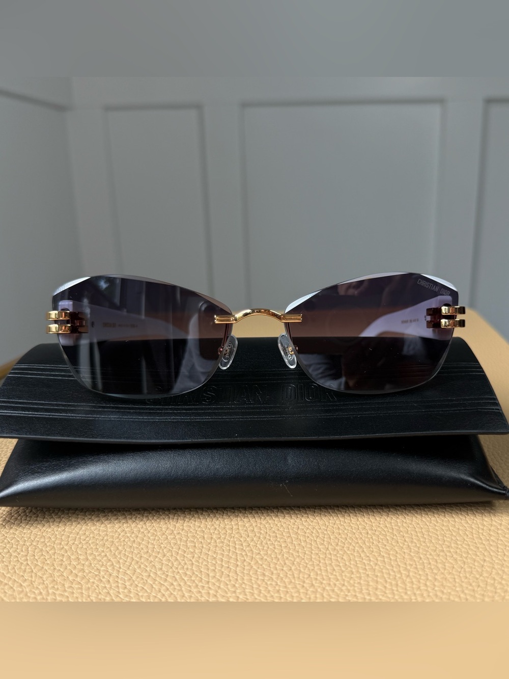 Dior Rimless Sunglasses with Gold Bridge and Black Gradient Lenses